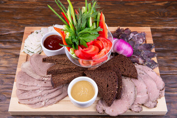 Kaza snack set with red onions, lard, Borodino bread, boiled tongue and balyk
