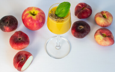peach and apple smoothie with fresh fruit 