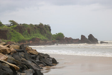 View of a cliff and rocks on a seaside.