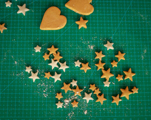 GIngerbread cookies of shape hearts and stars. Ready to bake.