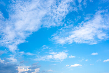 Sky blue or azure sky and clouds is bright white background. Everything lies above surface...