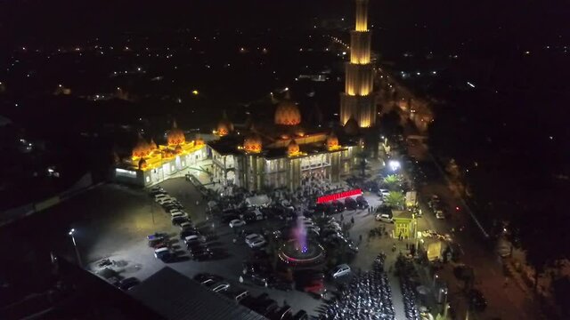shooting a large and luxurious mosque in the city of Jember at night using a drone camera, really beautiful and enchanting.