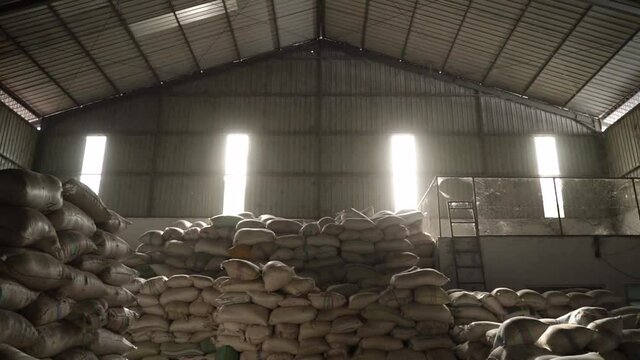 In a warehouse in bags rice, groats and a flour is prepared for sending to the consumer.