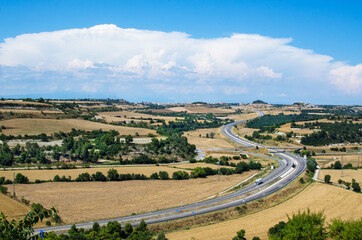 Fototapeta na wymiar horizontal landscape with curved road
