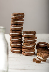 Chocolate chip cookies stacked with milk