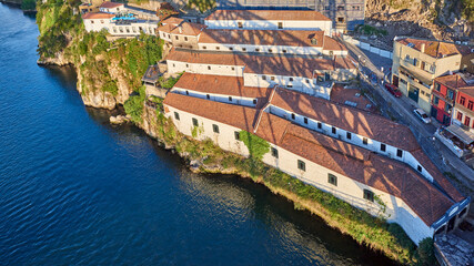 Fototapeta na wymiar Portugal. The city of Porto. Shadow of the Luis I Bridge on the left bank of the Douro River
