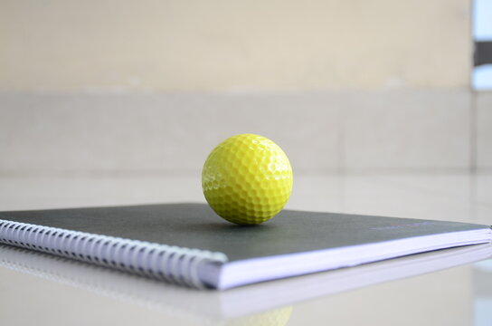 Golf Ball on a black background. Quarantine Photography. Photo captured by Nikon D7000 model Camera. Abstract, Background wallpaper colorful.