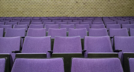 Naklejka premium Empty rows of seats in theater,cinema,concert hall. Concept of quarantine,cancellation of mass events to prevent spread of coronavirus infection,financial losses of organizers in entertainment sector