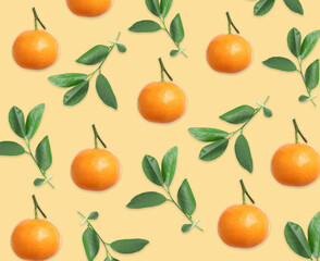 Pattern of tangerines and leaves on pale orange background