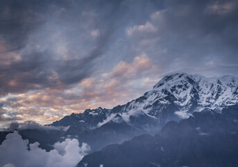 Fototapeta premium Clouds and sunrise sky over Annapurna mountains