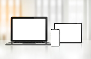 Laptop, mobile phone and digital tablet pc on office desk
