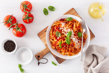 tagliatelle pasta with tomato sauce parmesan basil