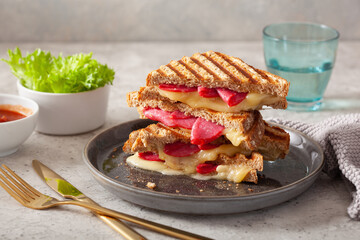 Grilled salami and cheese sandwich