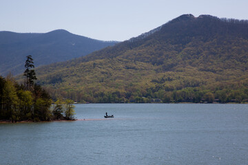 Fototapeta na wymiar Boat on a lake fishing