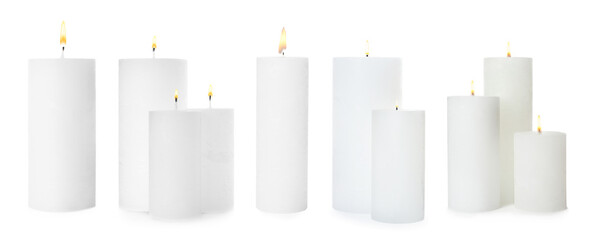 Set of burning wax candles on white background. Banner design