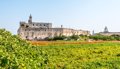 Fototapeta na wymiar : A view across the fields towards the abbey at Cala San Vito, Puglia, Italy