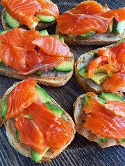 toast with salmon and avocado close-up