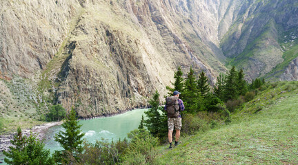 Fototapeta premium man walking in the mountains