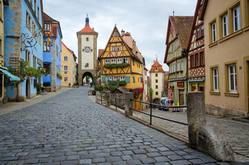 Fototapeta na wymiar ROTHENBURG OB DER TAUBER, GERMANY - OCTOBER 18, 2016: The Plonlein (Little Square) with the Siebers Tower on the left and Kobolzell Gate on the right, one of the most photographed spots in the world.