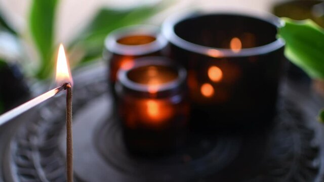 Close Up Of Burning Incense Sticks With Smoke And Candles, Meditation And Health Home Spa. High quality 4k footage
