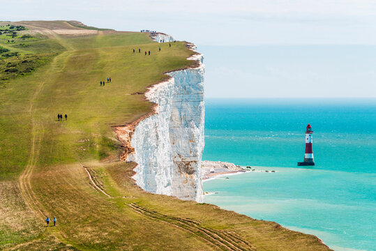 A view towards the Beachy Head lighthouse at the South Downs National Park, East Sussex, England