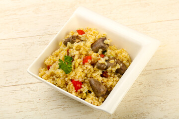 Bulgur with chicken hearts