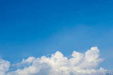 Naklejka na ściany i meble Cumulonimbus cloud with blue sky