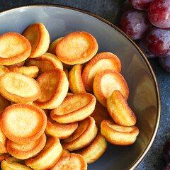 pancakes cereal Mini sweet breakfast snack or dessert Menu concept serving. food background top view copy space for text organic