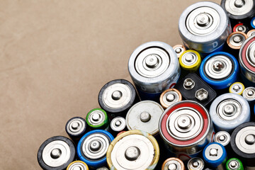 Used batteries toxic waste recycling and ecology issues concept background