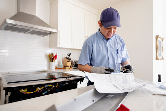 Man Installing New Kitchen