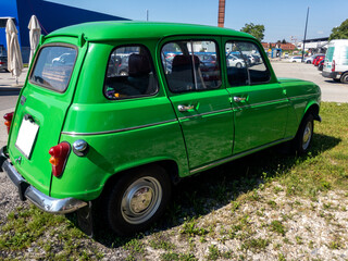 60s bright green car on the grass