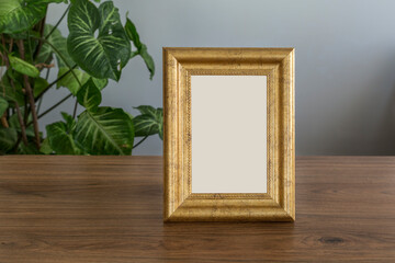 golden fram on the wooden table