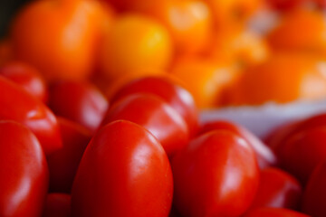 Fresh red tomatoes at a farmers market