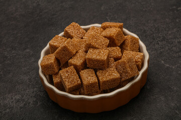 Cane sugar cubs in the bowl