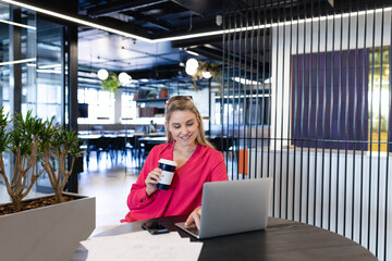 Caucasian woman working on her laptop 