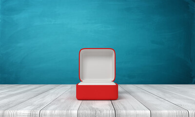 3d rendering of open red ring box on wooden table near blue wall.