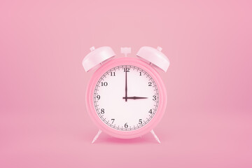 3d rendering of pink alarm clock on pink background
