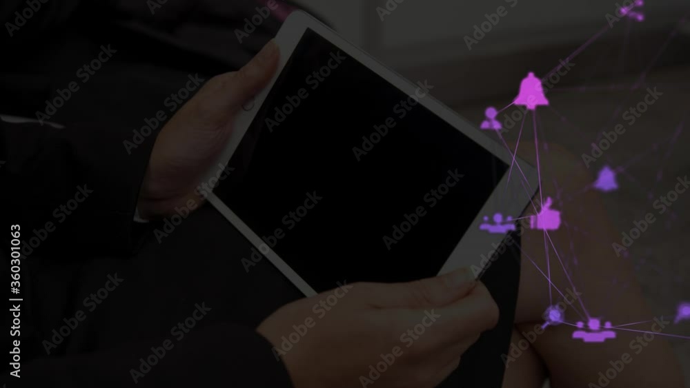Poster digital composite video of web of connections with icons moving against person using a digital table