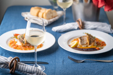luxury french restaurant image, seabass poele with white wine