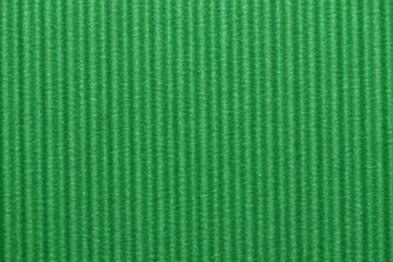 Light green colored corrugated cardboard texture useful as a background