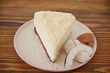 delicious cheesecake with coconut on  plate