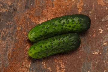 Ripe fresh green two cucumbers