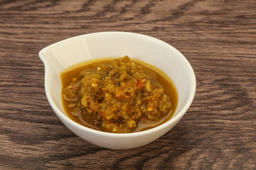 Green spicy sauce in the bowl