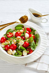 Simple veggie salad of young peas, grape tomatoes