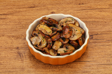 Roasted champignon with herbs and spices