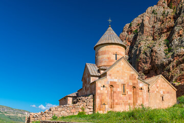 Obraz premium Noravank Monastery near the walls of red rocks in Armenia, a beautiful attraction in a picturesque place