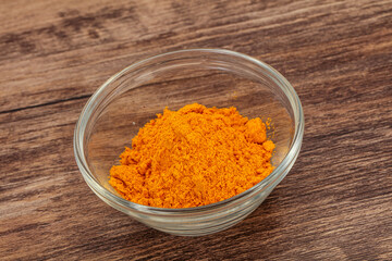 Tumeric powder in the bowl