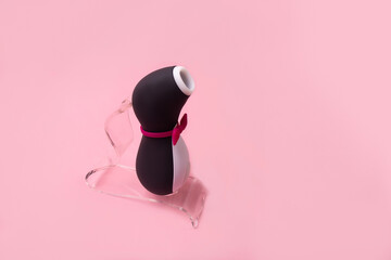on a pink background sex product, toy for adults