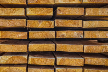 Wood air drying (seasoning lumber or wood seasoning). Timber. Lumber. Close-up. Wooden planks. Beams. Air-drying timber stack