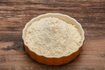 Wheat flour heap in the bowl
